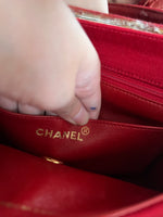 CHANEL HANDBAG IN RED CANVAS FLAP BAG
