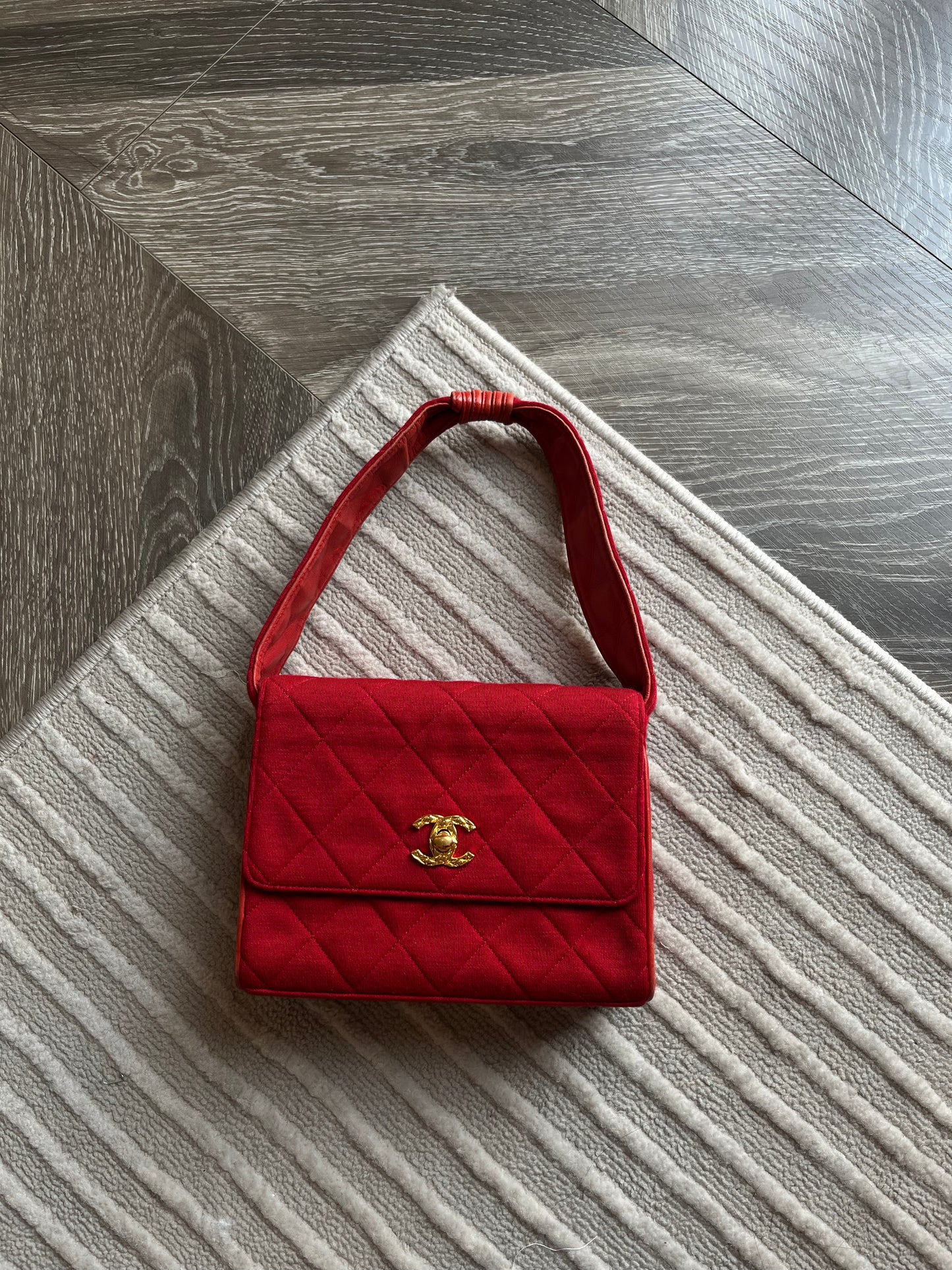 CHANEL HANDBAG IN RED CANVAS FLAP BAG