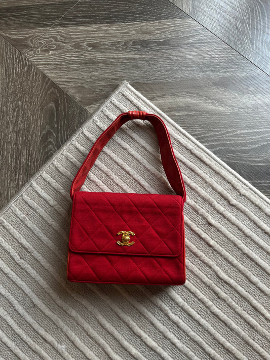 CHANEL HANDBAG IN RED CANVAS FLAP BAG