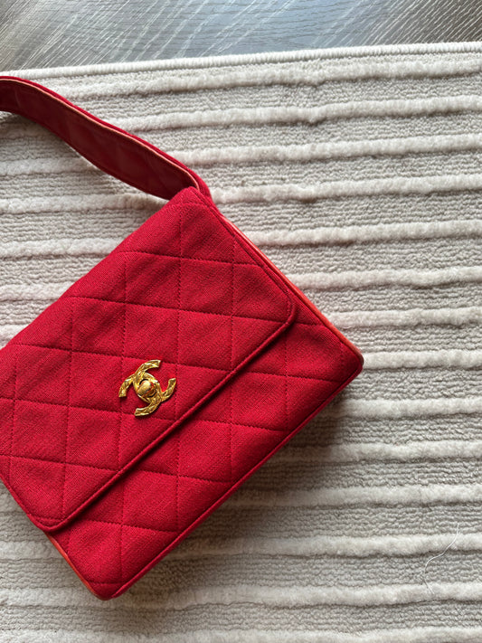 CHANEL HANDBAG IN RED CANVAS FLAP BAG